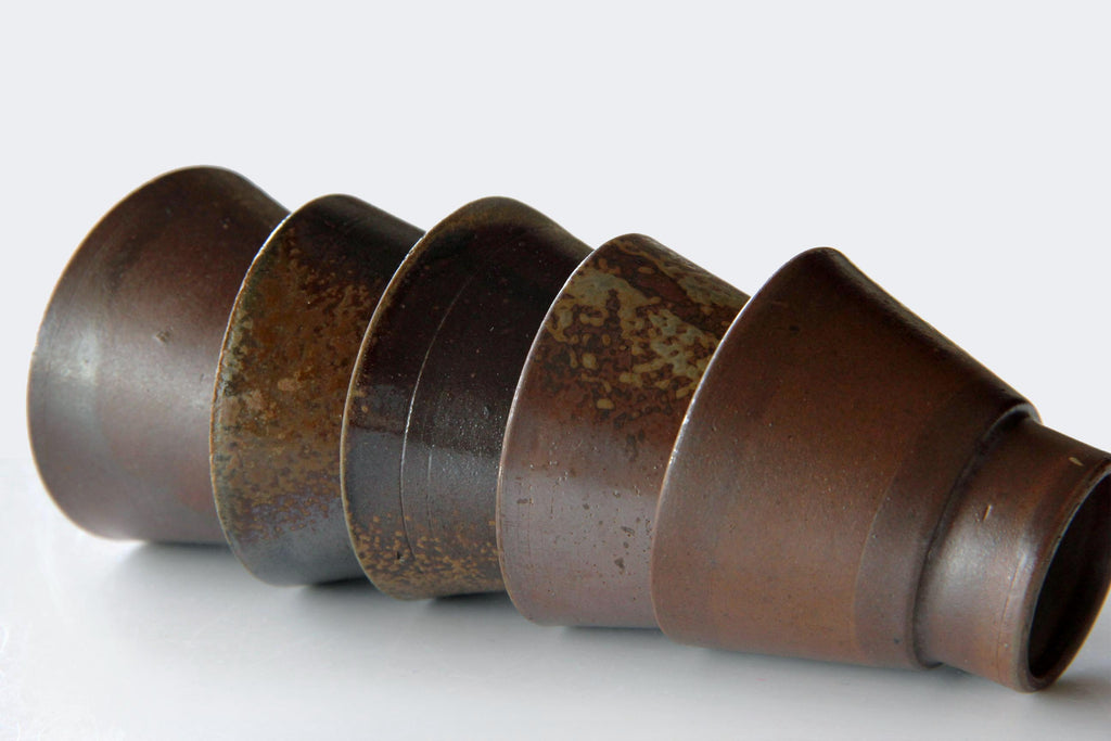 Small ceramic cup for Sake or Sencha tea. Japanese Bizen ware.