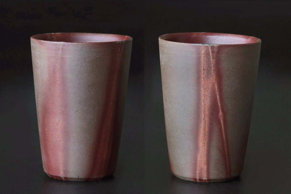 Two views of a Bizen mug with a reddish flame effect running diagonally down the surface.