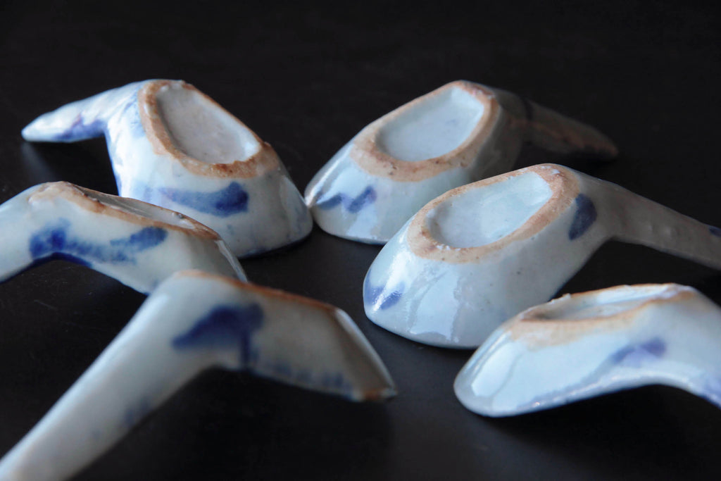 Antique Chinese tableware. Qing Dynasty pottery. Blue and white glaze.