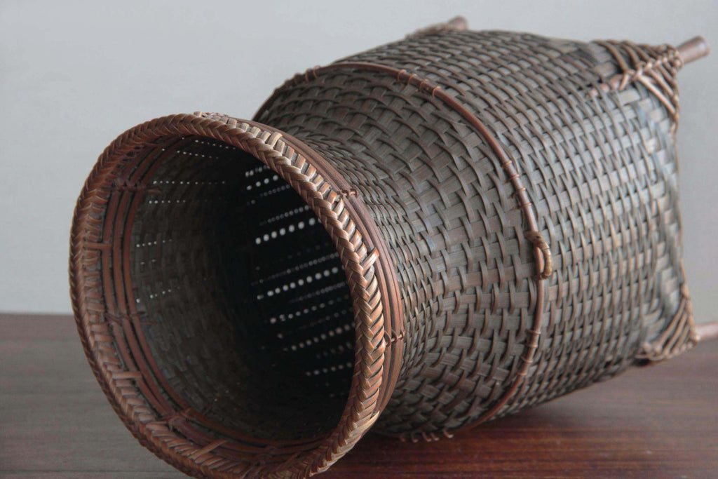 Hand woven bamboo basket or flower vase. Japanese craft