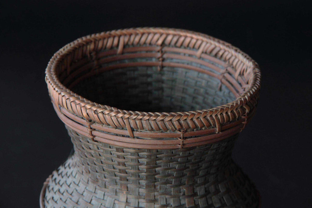 Hand woven bamboo basket or flower vase. Japanese craft