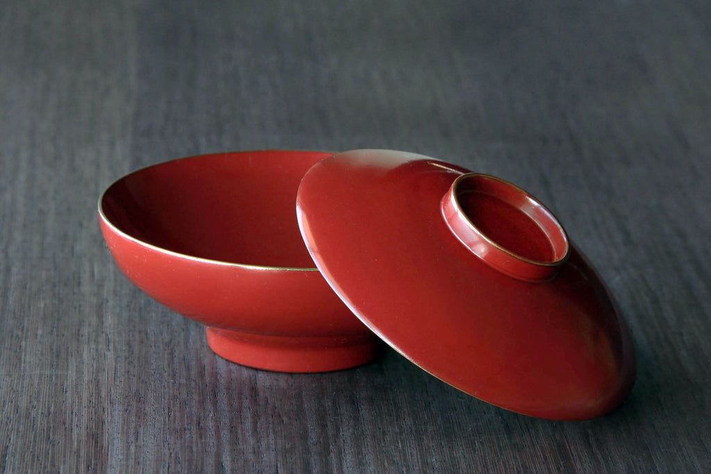 Red wooden bowl with lid. Classic Japanese tableware. With beautiful natural Urushi lacquer.