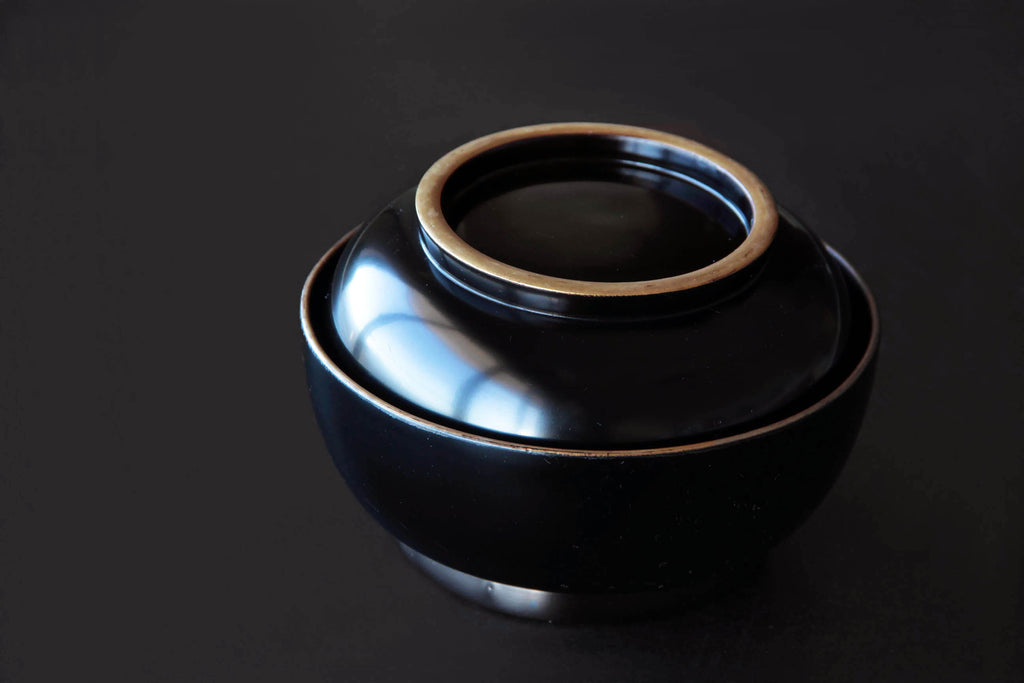 Black wooden bowl with lid. Classic Japanese tableware. With beautiful natural Urushi lacquer.