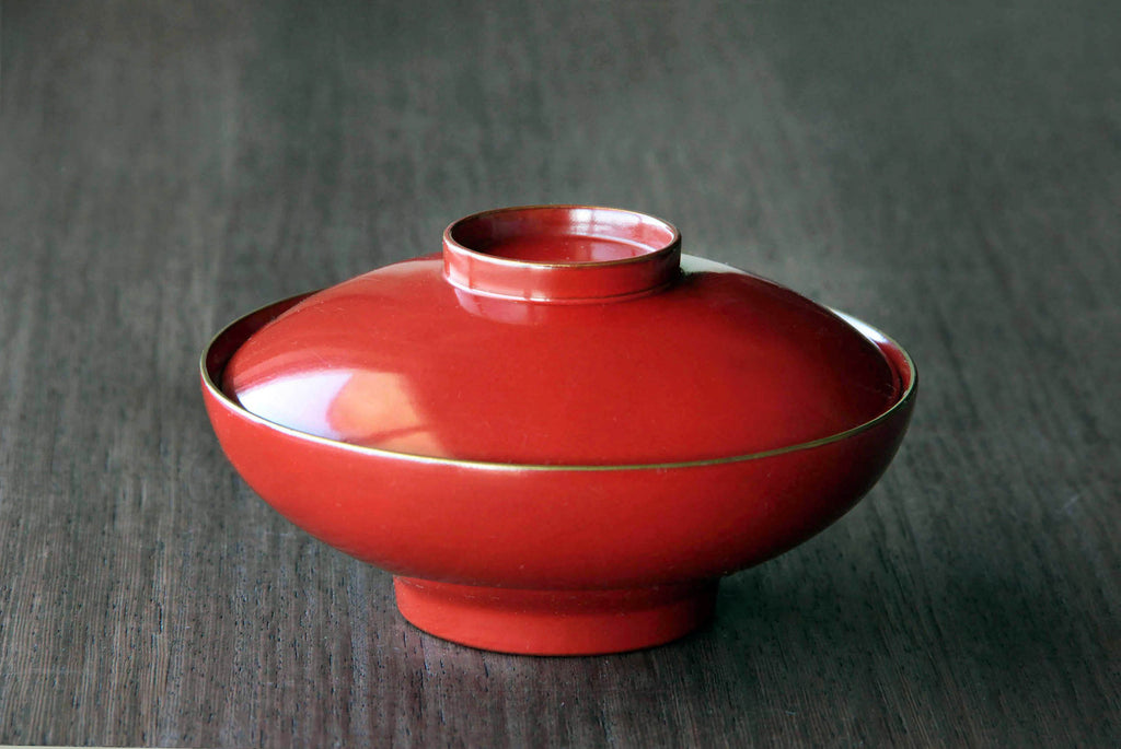 Red wooden bowl with lid. Classic Japanese tableware. With beautiful natural Urushi lacquer.