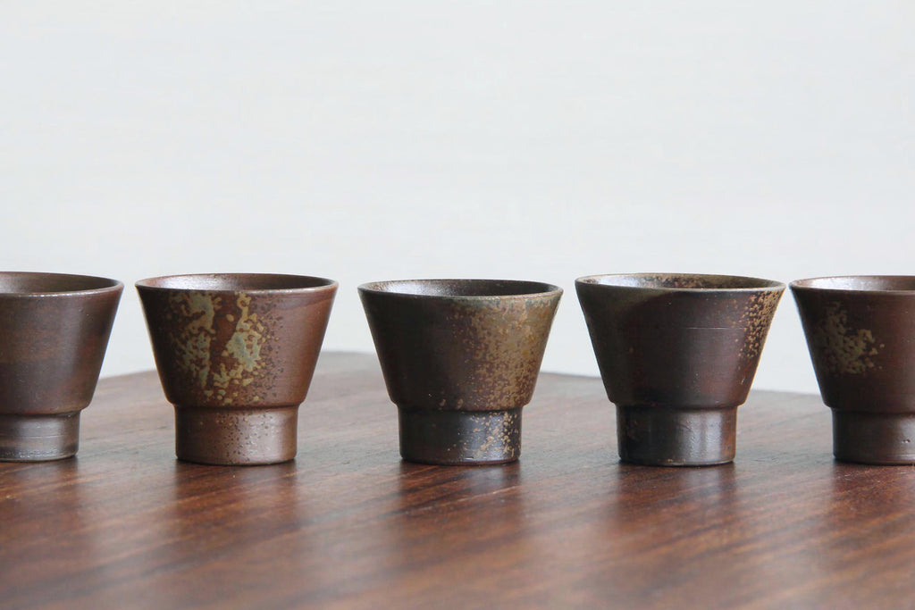 Small ceramic cup for Sake or Sencha tea. Japanese Bizen ware.