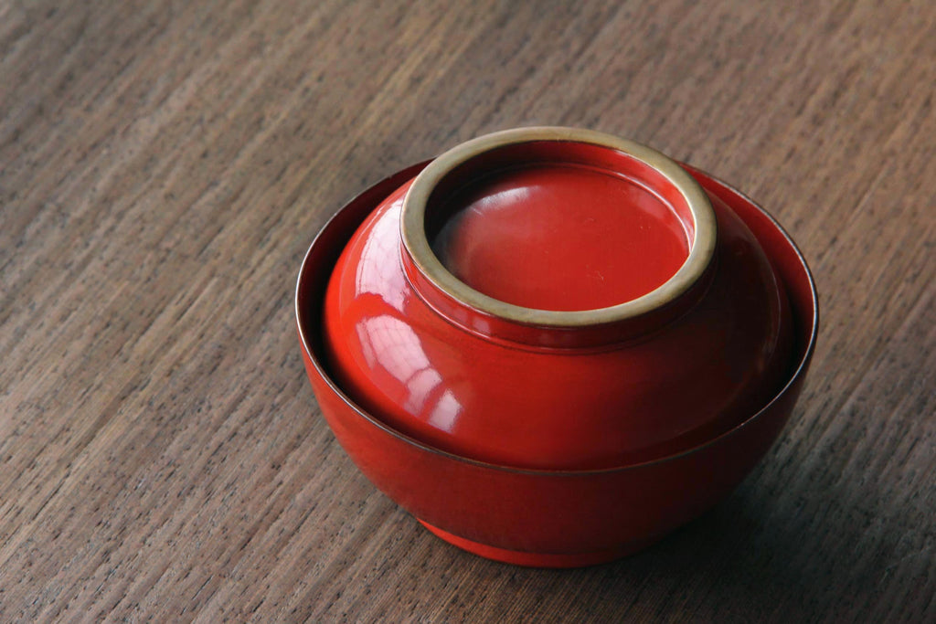 Antique wooden bowl with lid. Japanese Urushi lacquer ware. Japanese cuisine tableware.