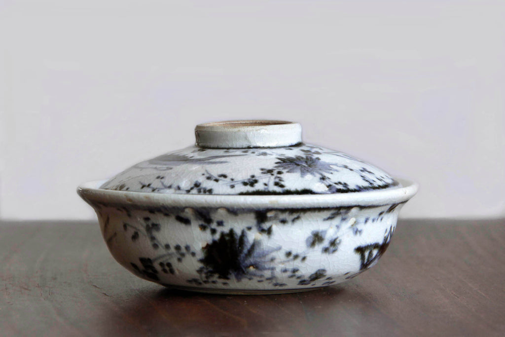 White and blue idded bowl. Japanese ceramic tableware.