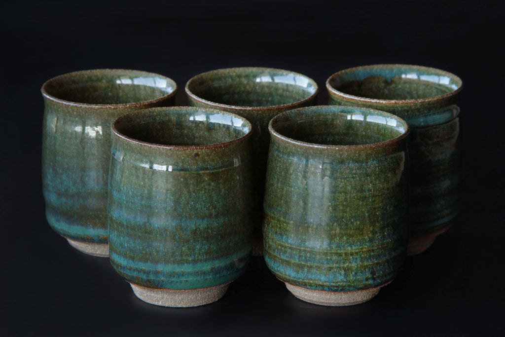 Green glaze tea cup. Japanese Agano pottery.