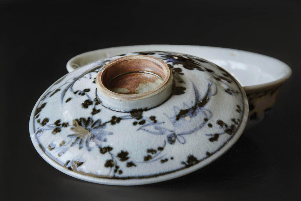White and blue idded bowl. Japanese ceramic tableware.