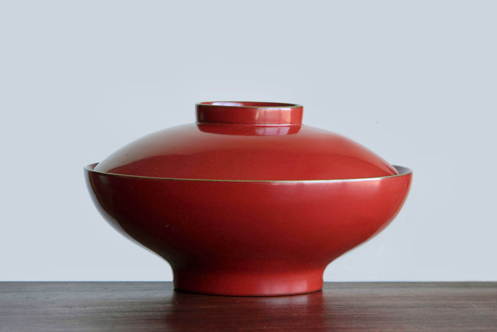 Red wooden bowl with lid. Classic Japanese tableware. With beautiful natural Urushi lacquer.