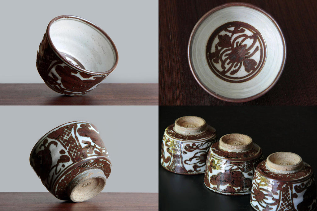 Interior and exterior view of yunomi cups arranged in rows, highlighting hand-painted
decoration and natural foot