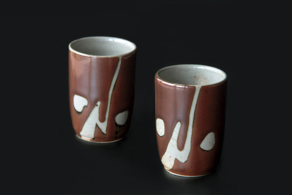 Brown ceramic cup from Mashiko ware. 