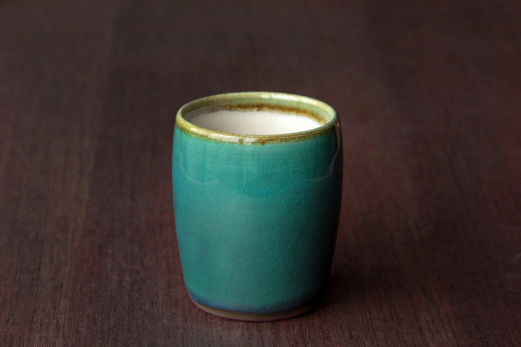 Emerald green glaze tea cup. Japanese tea ware.