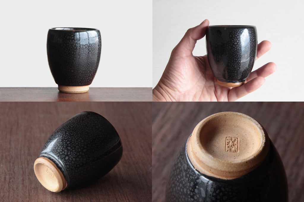 Black glaze tea cup by Otaru kiln in Hokkaido. 