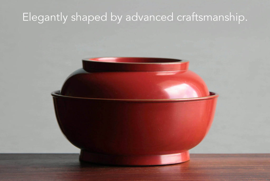 Stacked Japanese lidded lacquer bowl with elegant traditional shape