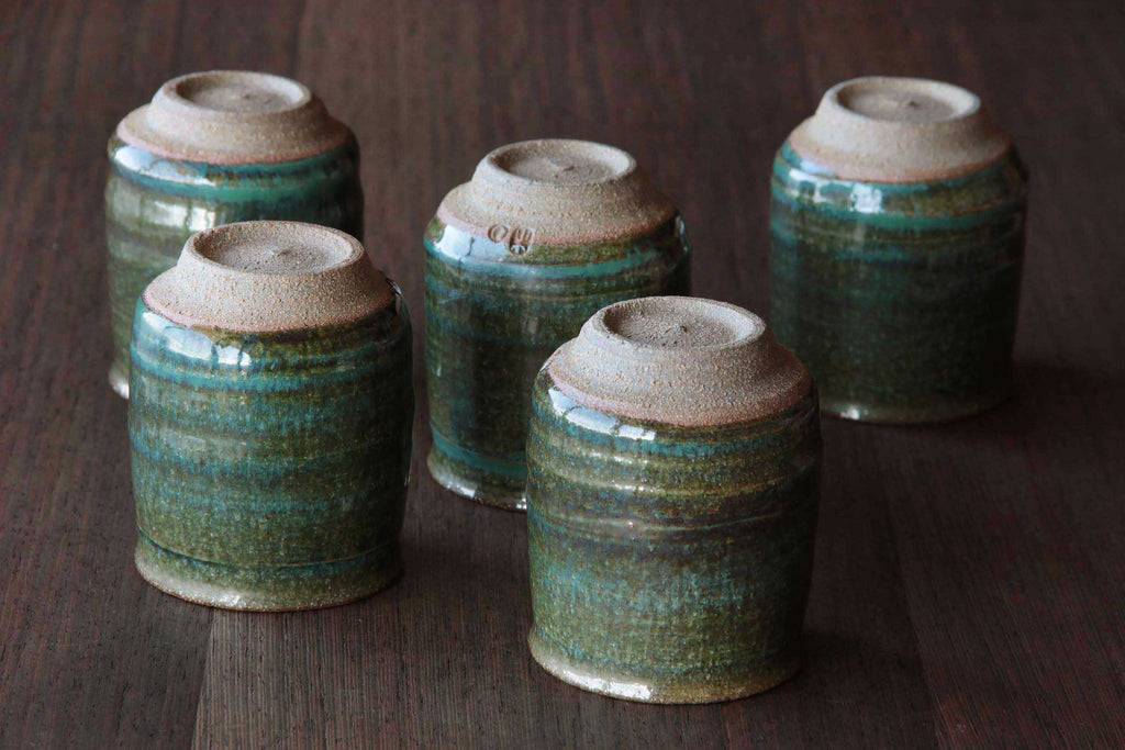 Green glaze tea cup. Japanese Agano pottery.