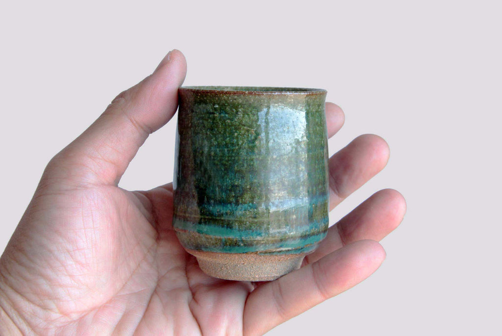 Green glaze tea cup. Japanese Agano pottery.