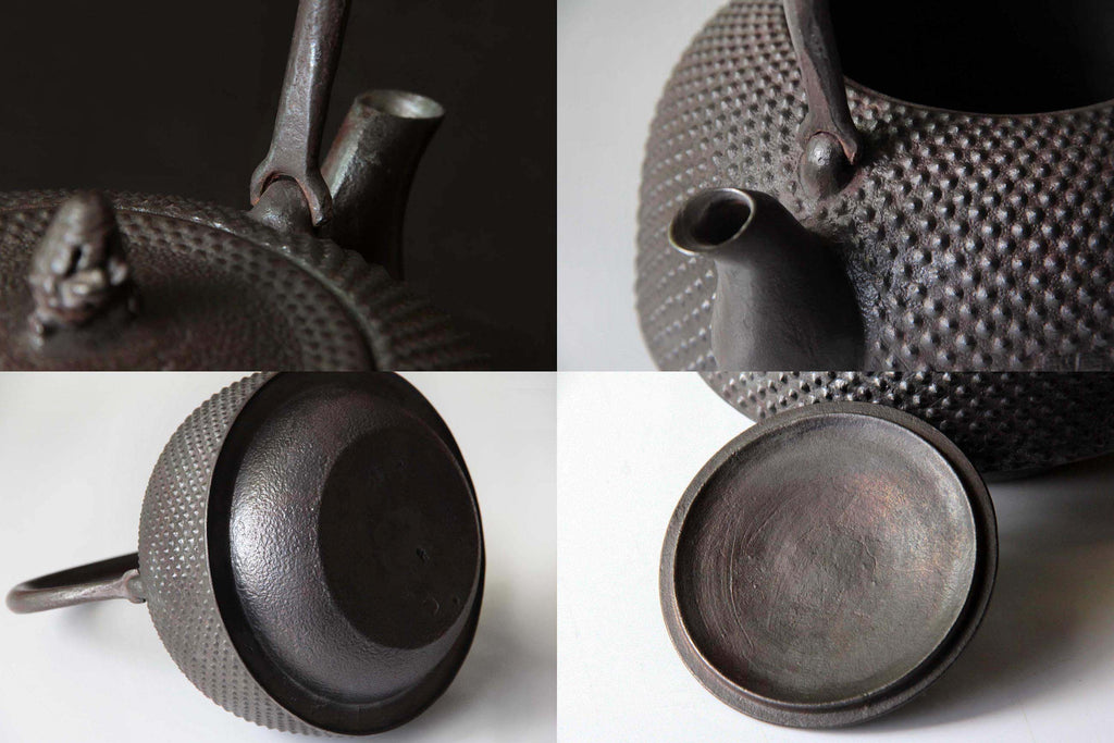 Traditional Nanbu Tekki cast iron kettle
with pinecone-shaped knob and dotted
surface pattern