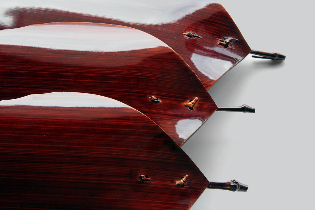 back view of Japanese Hida Shunkei lacquerware plate in the shape of a leaf, used for wagashi or tea ceremony