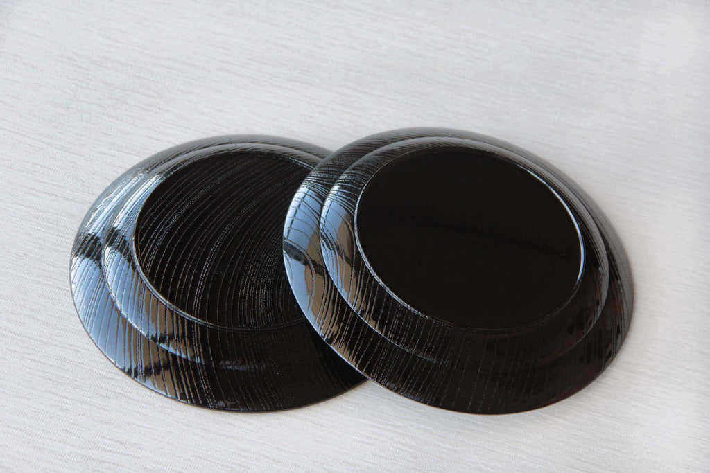 black wooden plate with Urushi finish, bottom side