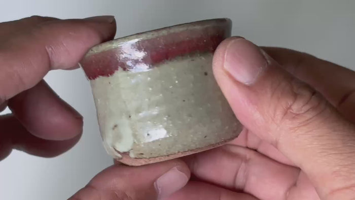 Rotating and close-up video showcasing the shape, texture, and details of the vintage Sake cup.