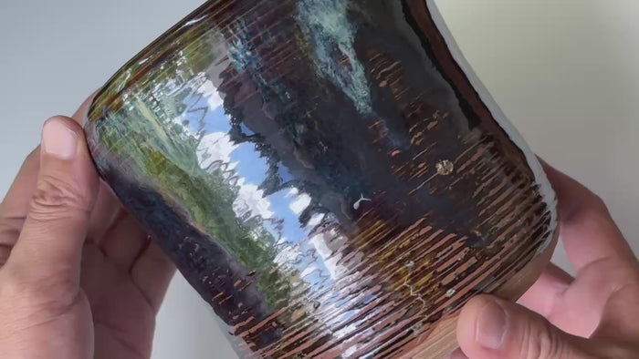 Rotating and close-up video showcasing the shape, texture, and details of the Takatori ware Mizusashi, a water container for tea ceremony.