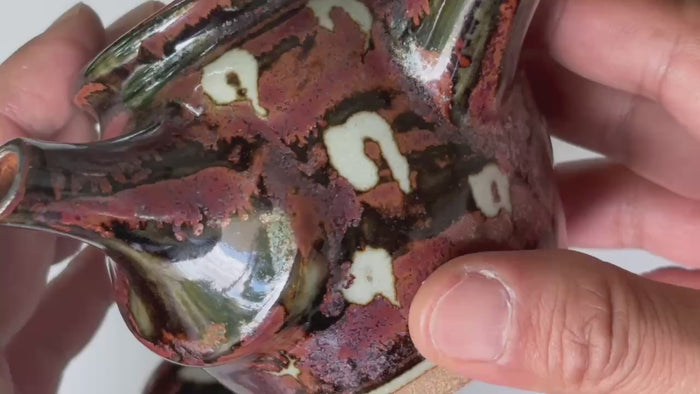 Rotating and close-up video showcasing the shape, texture, and details of the teapot by Toshiro Ono.