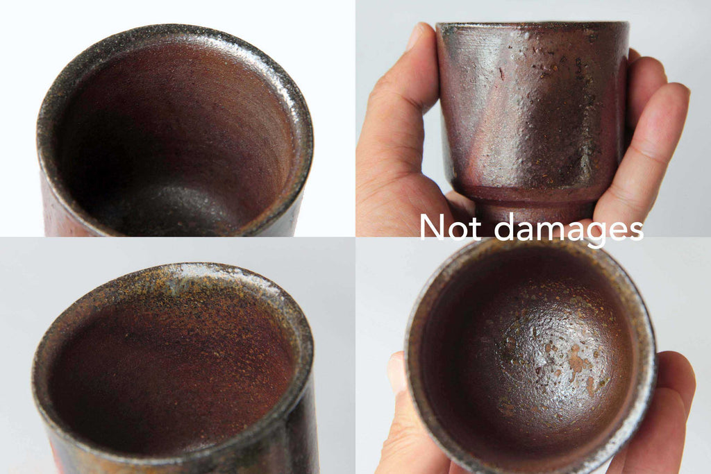 Bizen ware yunomi tea cup shown in four close-up views, highlighting its natural rough surface textures, reddish-brown clay, and kiln-fired patterns, with note indicating surface marks are not damages