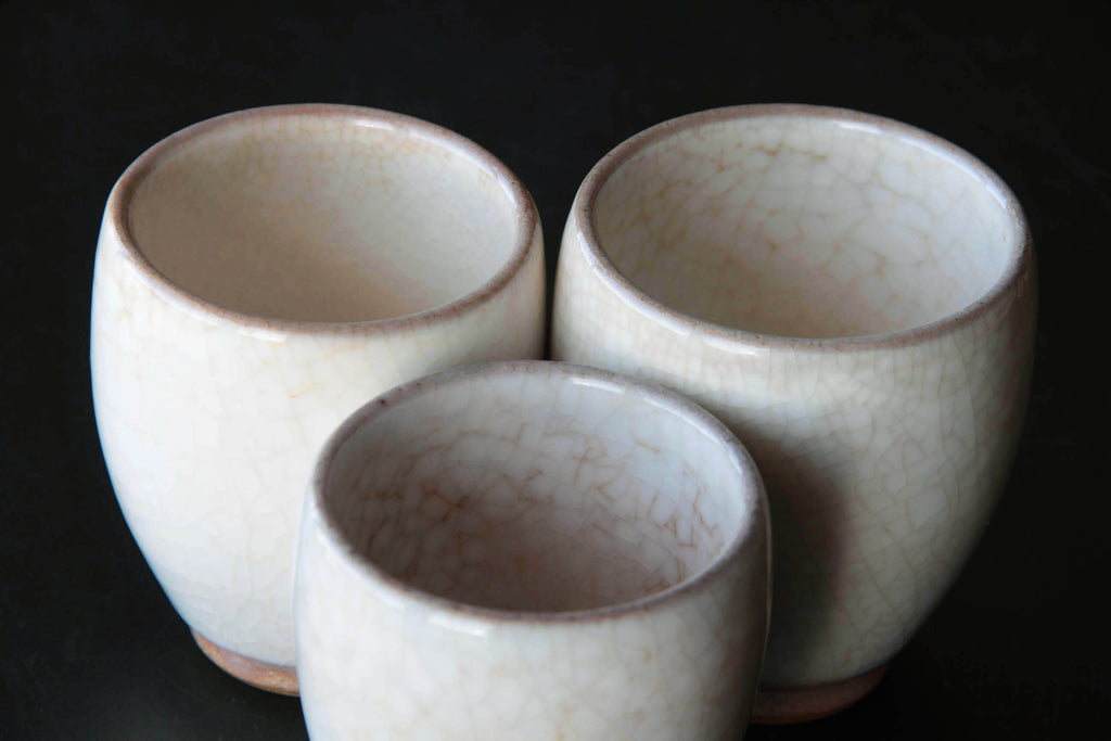 white glaze vintage tea cup by Otaru Kiln in Hokkaido. Nice crackle vintage surface.