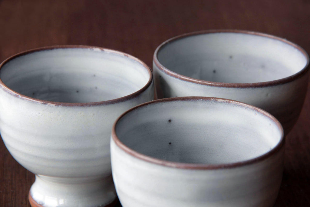 White tea cup with stand.