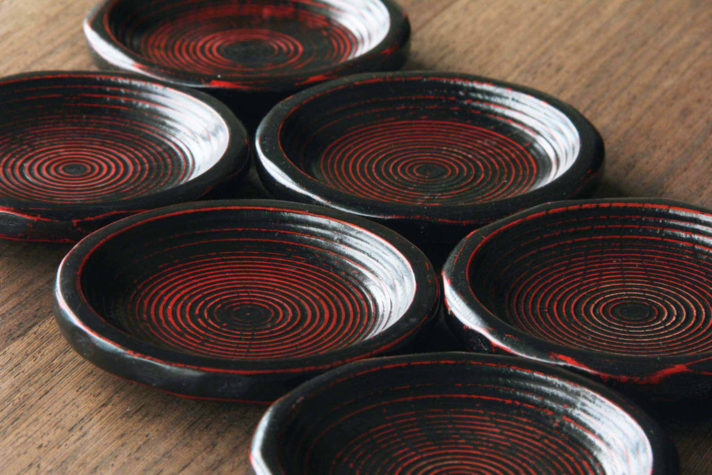 Urushi lacquered wooden saucer. Japanese hand craft.