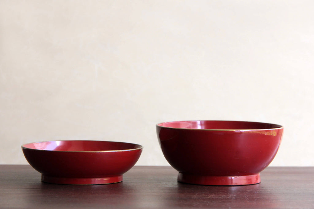 red wooden bowl with lid