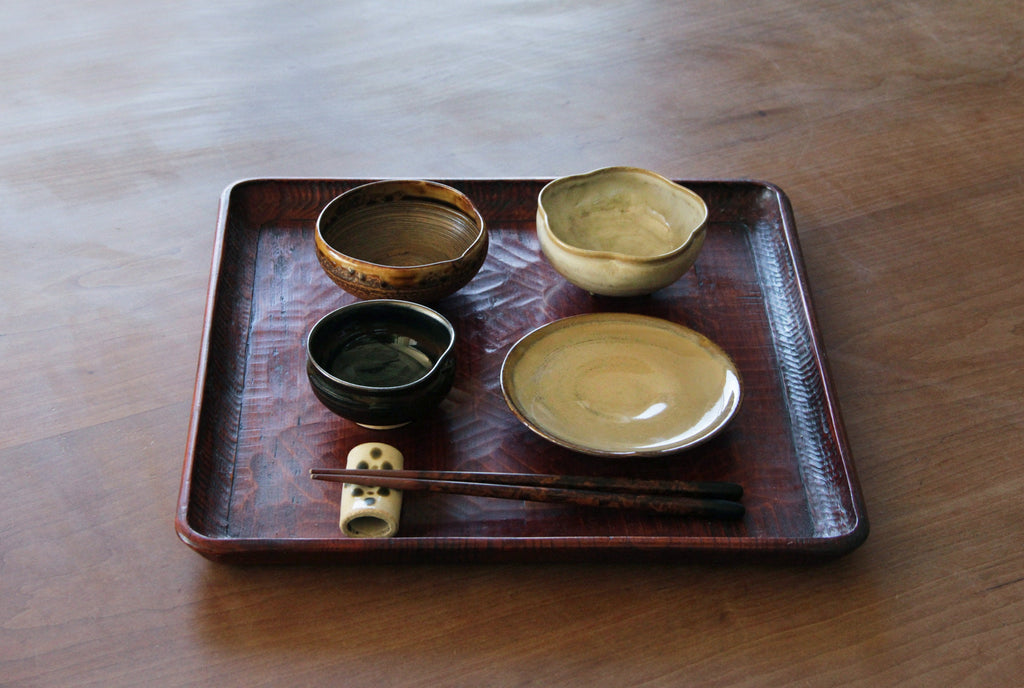 Japanese tableware on tray 
