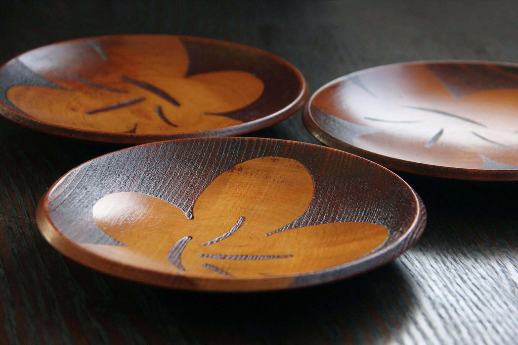 Japanese wooden dish with flower motif